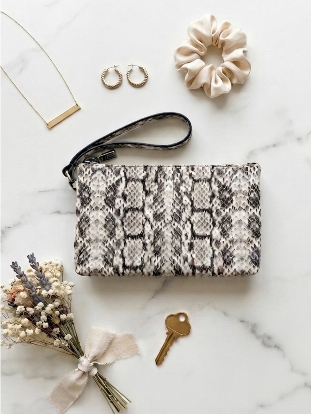 Snake-Print Wristlet Clutch